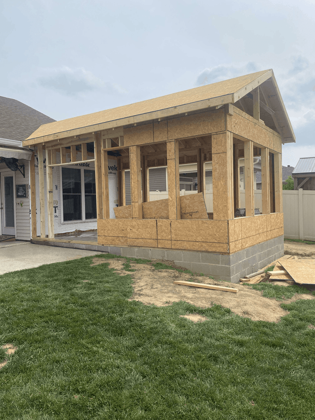Sunroom addition framed and sheathed during construction